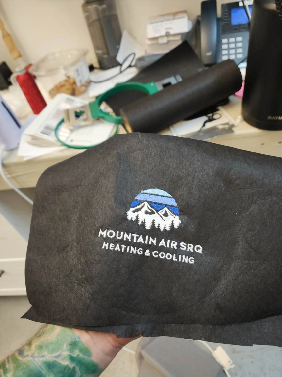 Artwork in digitized and stitch form